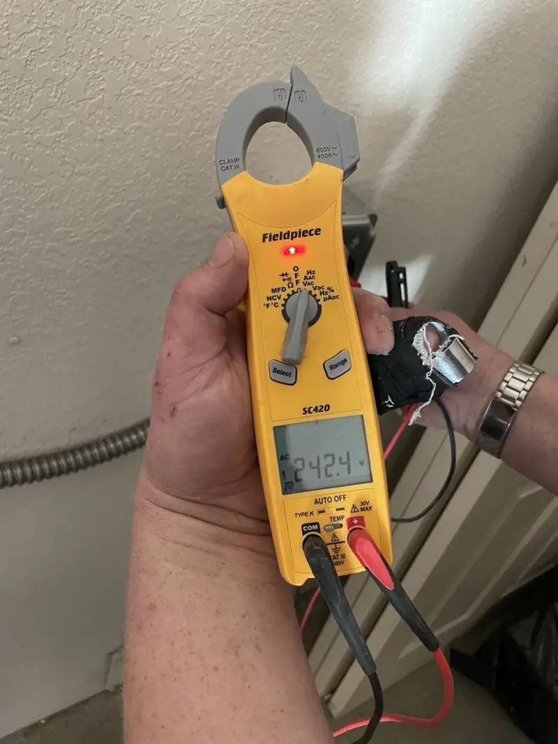 Voltage testing with clamp meter during Hot Tub / Pool Electrical Wiring in Lima
